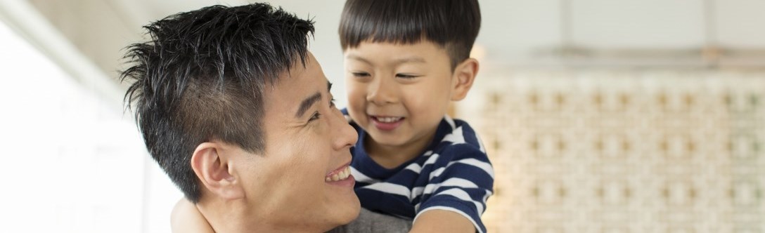 Son on father's shoulder