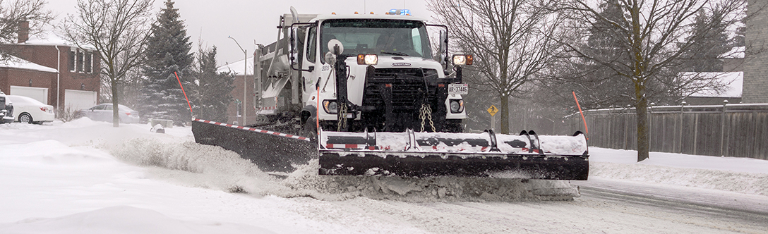 Image of snow plow clearing the road