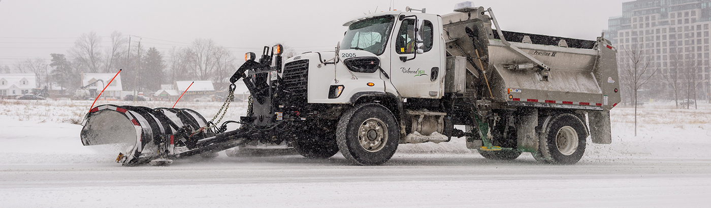 Image of snow plow clearing the road