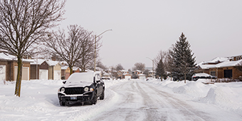 Car parked on Richmond Hill street during winter