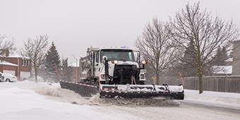 Richmond Hill plow on street clearing snow