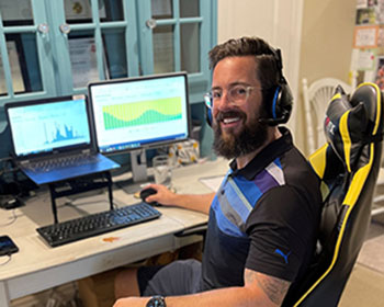 Andrew Nichols, Project Manager Corporate Asset Management at his desk. 